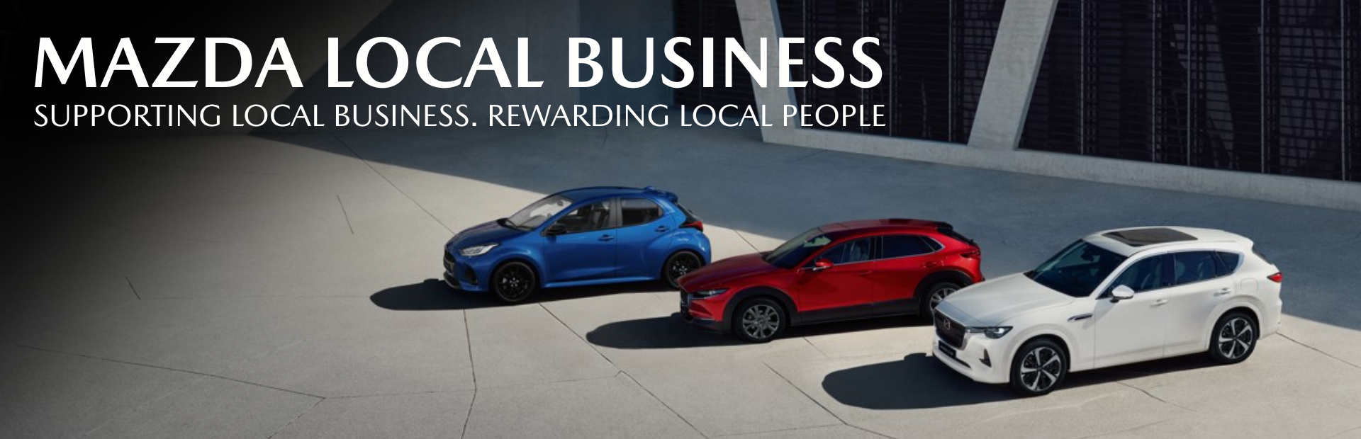 Mazda Local Business with three cars in blue, red, and white.
